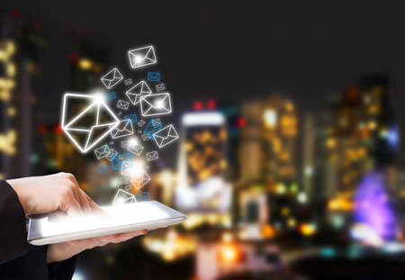 Business woman are sending email marketingの写真素材