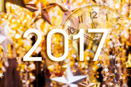 2017 year on gold star and bokeh lightの写真素材