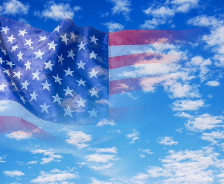 USA flag on blue sky with cloud
