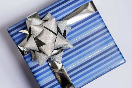 Blue gift box with silver ribbon
