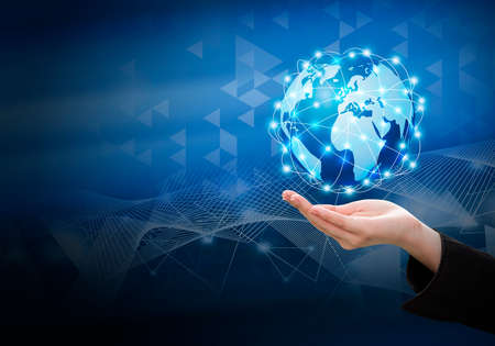 Business woman hand holding global network connection design with copy spaceの写真素材