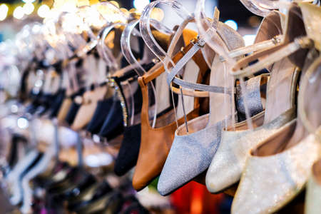 Fashion shoes on shelves in the shopの写真素材