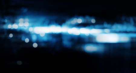 Abstract blurred blue technology background of night cityの写真素材