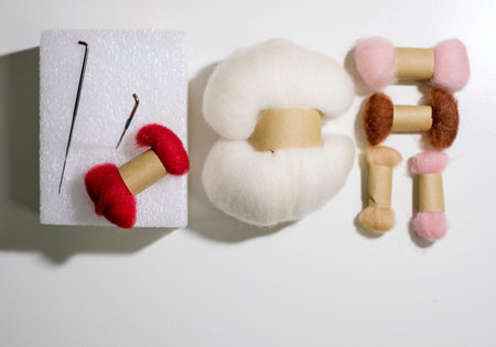 Needle felt on white background with copy space