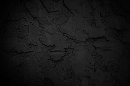 Black cement wall texture backgroundの写真素材