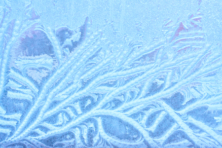 Ice patterns on winter glassの写真素材