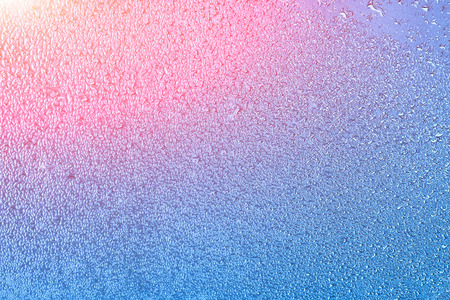 Wet window with condensation on the glass. Natural background with high humidityの写真素材
