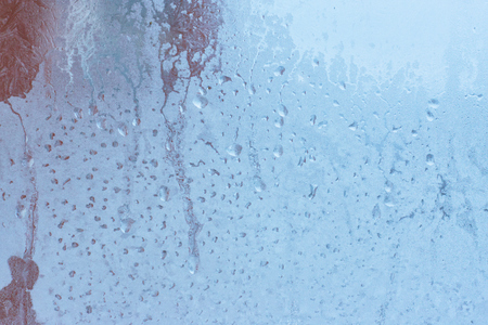 Ice texture on window, natural background , frozen glassの写真素材