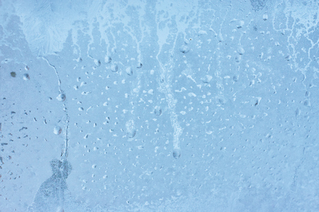 Ice texture on window, natural background , frozen glassの写真素材