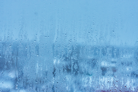 Natural background with condensation on the windows , high humidity , hot water vaporの写真素材