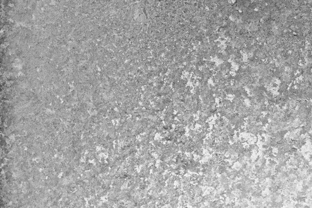 Black and white ice patterns on the glass. Monochrome winter background with a frosty textureの写真素材