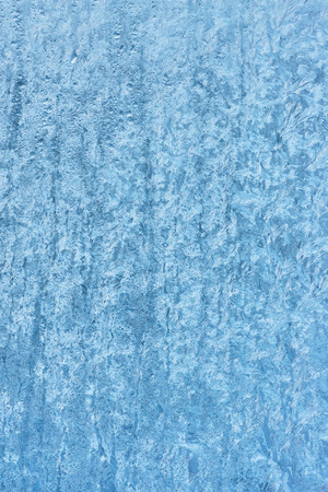 Ice texture on window, natural background , frozen glassの写真素材