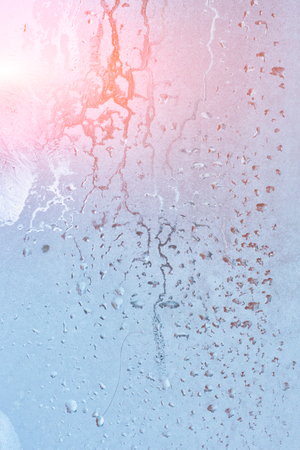 Ice texture on window, natural background , frozen glassの写真素材