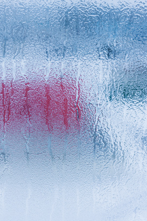 Water condensation on window during winter. Strong humidityの写真素材