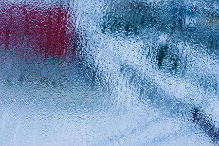 Water condensation on window during winter. Strong humidityの写真素材