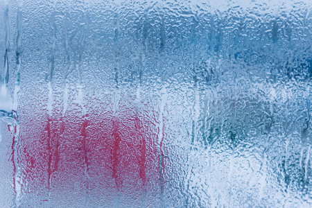 Water condensation on window during winter. Strong humidityの写真素材