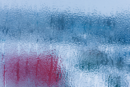 Water condensation on window during winter. Strong humidityの写真素材