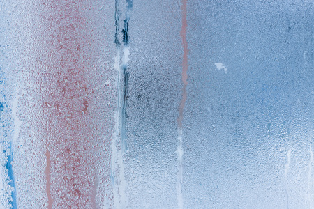 Water condensation on window during winter. Strong humidityの写真素材