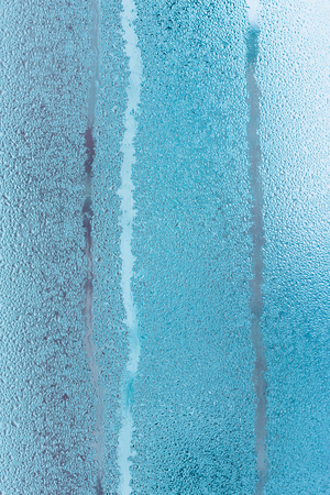 Water condensation on window during winter. Strong humidityの写真素材