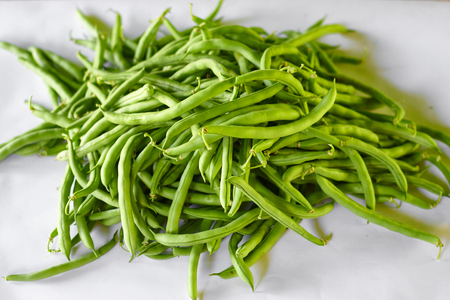 Green beans, natural fresh product on white backgroundの写真素材