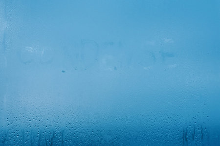 The inscription condenses on glass close-up with condensation. Background with water drops. High...
