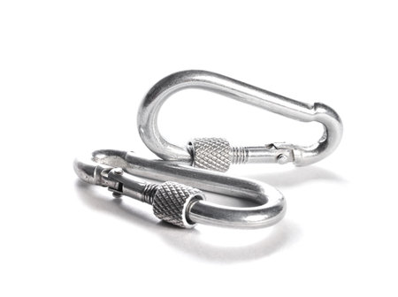 Isolated mountaineering in two object metal carbine is fastened. Set of climbing and camp...