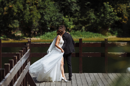 Georgeous wedding couple. Wedding for two. Pretty bride and stylish groom.の写真素材
