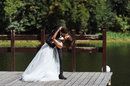 Georgeous wedding couple. Wedding for two. Pretty bride and stylish groom.の写真素材