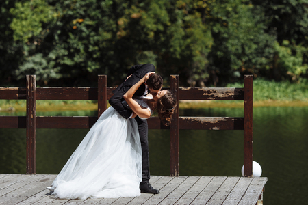 Georgeous wedding couple. Wedding for two. Pretty bride and stylish groom.の写真素材