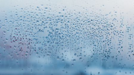 Realistic water droplets for decoration and covering on the transparent background.Condensation formed by water droplets on glass due to poor and inadequate ventilationの写真素材