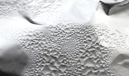 Water Drops On Foil Grey White Background, Texture colorful water drop. Abstract detail of moisture...