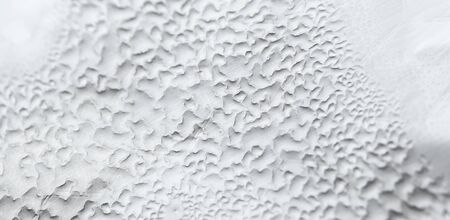 Water Drops On Foil Grey White Background, Texture colorful water drop. Abstract detail of moisture condensation problems, hot water vapor condensed on foil close upの写真素材