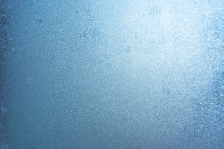Winter frozen background, beautiful texture of frozen glass in winter, negative air temperatureの写真素材
