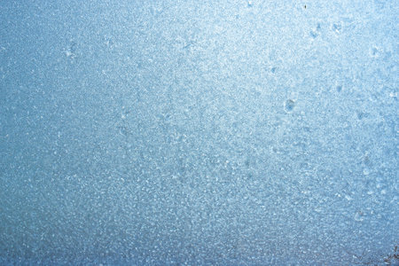 Winter frozen background, beautiful texture of frozen glass in winter, negative air temperatureの写真素材