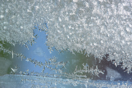 Winter frozen background, beautiful texture of frozen glass in winter, negative air temperatureの写真素材