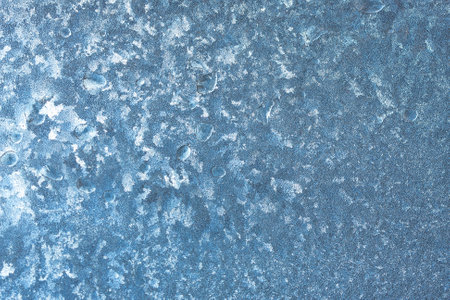 Beautiful natural background or texture of frozen transparent glass on the window in winter, strong cold concept, horizontal image, copy space for your design or textの写真素材