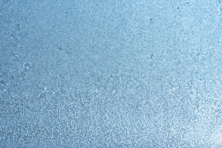 Winter frozen background, beautiful texture of frozen glass in winter, negative air temperatureの写真素材