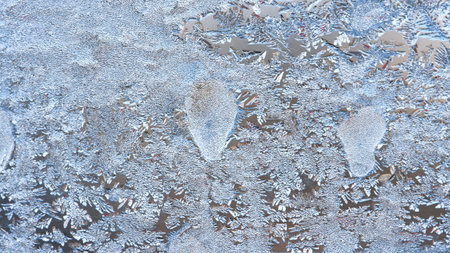 Graceful expressive winter natural background, macro texture. Copy space. Frosty pattern on winter...