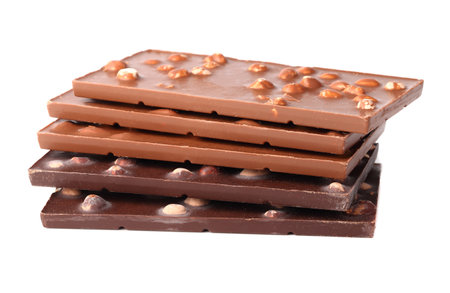 Chocolate bars with nuts close up on white isolated backgroundの写真素材
