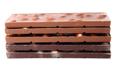 Chocolate bars with nuts close up on white isolated backgroundの写真素材