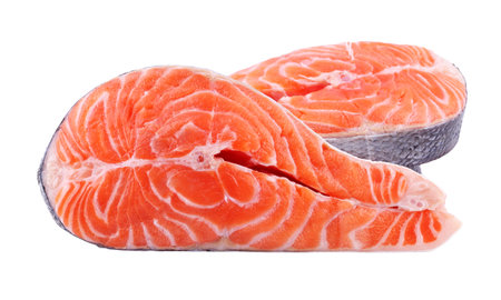 Salmon steak, fresh fish slice, trout on white isolated background with clipping path, full depth of fieldの写真素材
