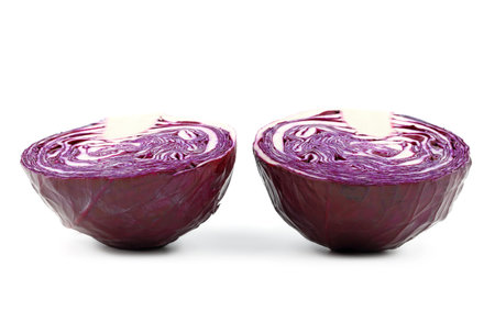 Red cabbage cut isolated on white background with clipping pathの写真素材