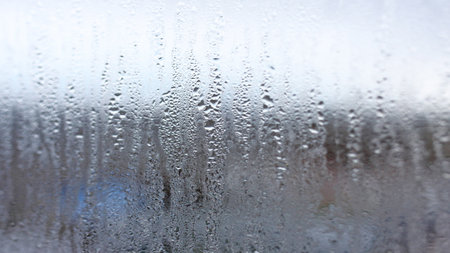 Horizontal background of condensation on transparent glass with high humidityの写真素材