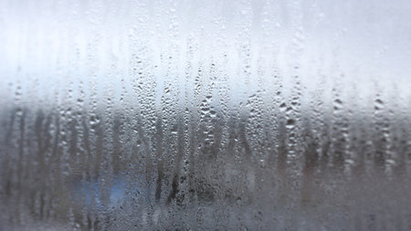 Horizontal background of condensation on transparent glass with high humidityの写真素材