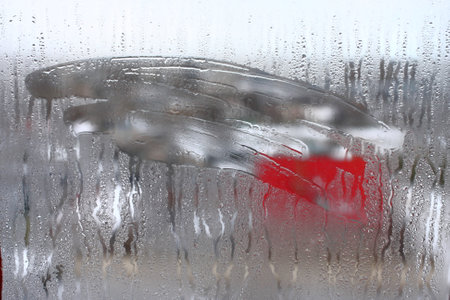 Horizontal background of condensation on transparent glass with high humidityの写真素材