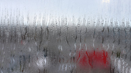 Horizontal background of condensation on transparent glass with high humidityの写真素材
