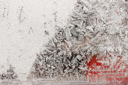 Background of natural frozen glass, window glass with a beautiful patternの写真素材