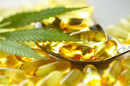 Cannabis CBD Tablets, Hemp CBD Oil Gelatin Capsules, Edible Organic Food Supplementsの写真素材