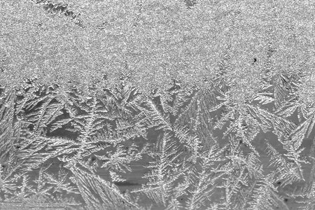 Frost on the window, Natural texture on glass with frozen pattern. Copy space, natural background,...