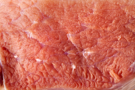 Meat textured for background. Piece of fresh red meat close up